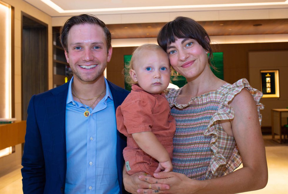 Alex and Taylor Johnson with son Levi.jpg